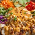 the ultimate bang bang chicken bowl your new go to dinner featured
