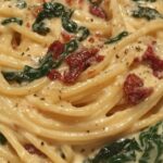 the ultimate spaghetti spinach with sun dried tomato cream sauce featured