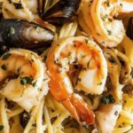 irresistible tasty garlic seafood pasta your new go to dish featured
